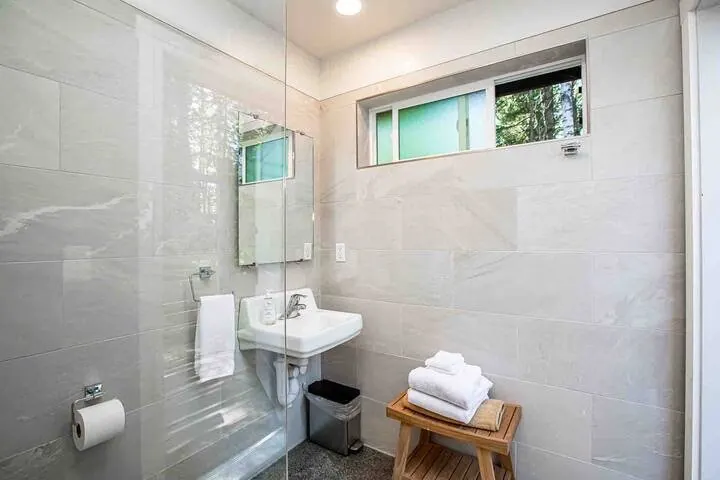 Shared bathroom facilities, a walk from Bungalow.