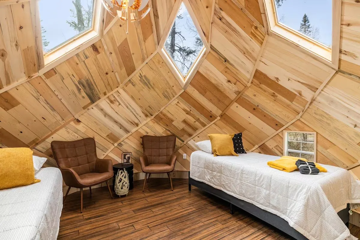 Timber interior and sleeping area in Havu Zome