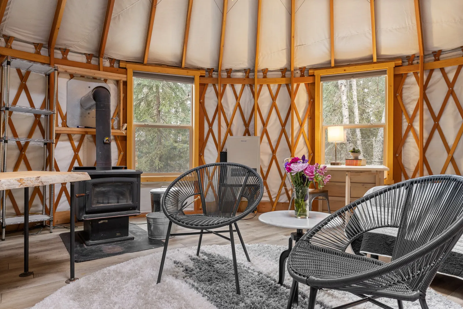 Window-side seating area inside the yurt